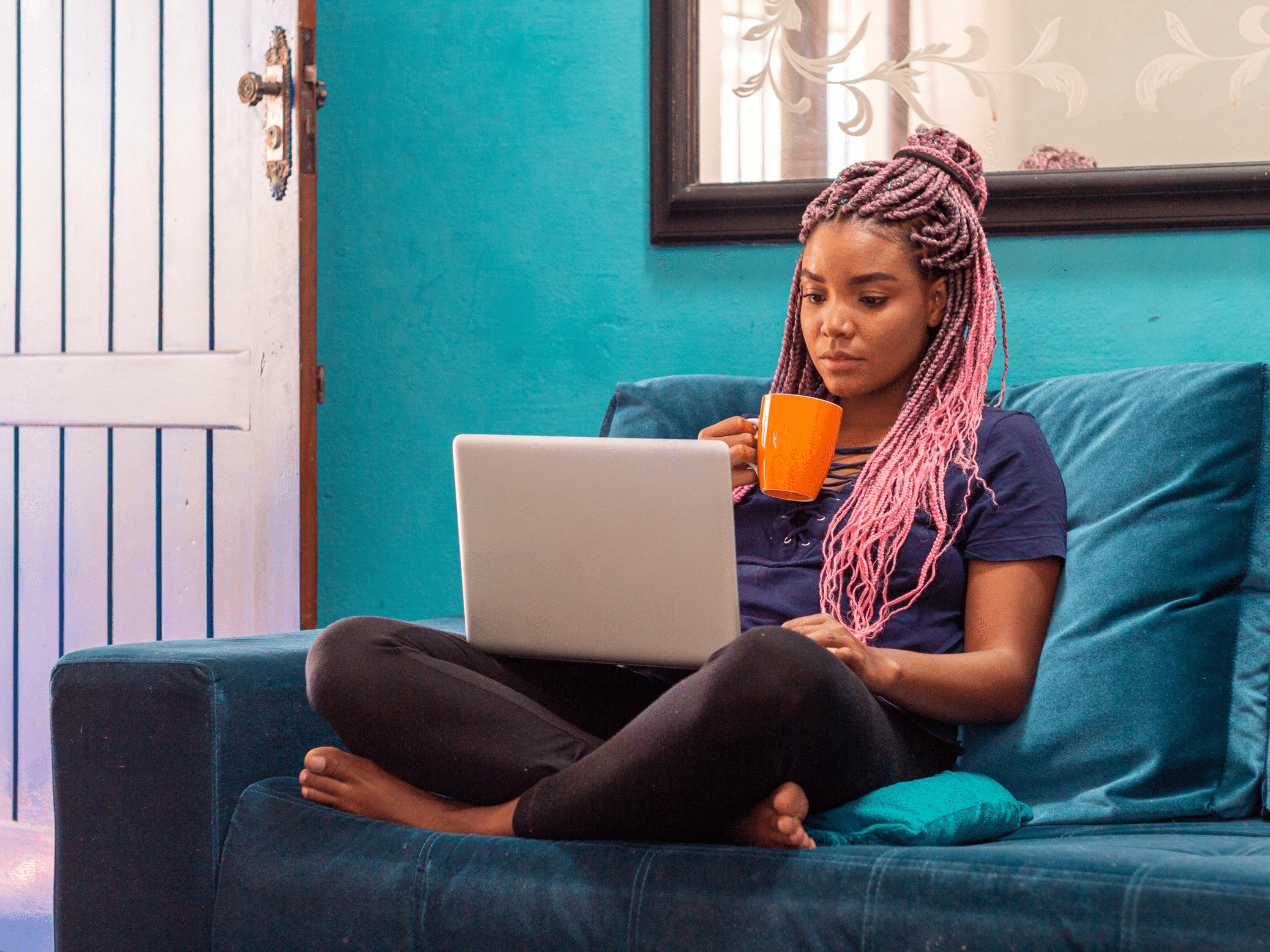 woman studying on couch